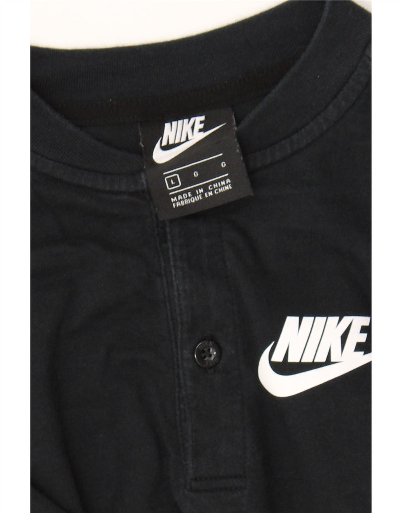 NIKE Girls T-Shirt Dress 9-10 Years Large Black Cotton Vintage Nike and Second-Hand Nike from Messina Hembry 