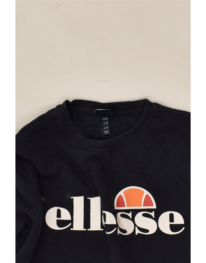 ELLESSE Womens Loose Fit Graphic Sweatshirt Jumper UK 14 Large  Navy Blue | Vintage Ellesse | Thrift | Second-Hand Ellesse | Used Clothing | Messina Hembry 