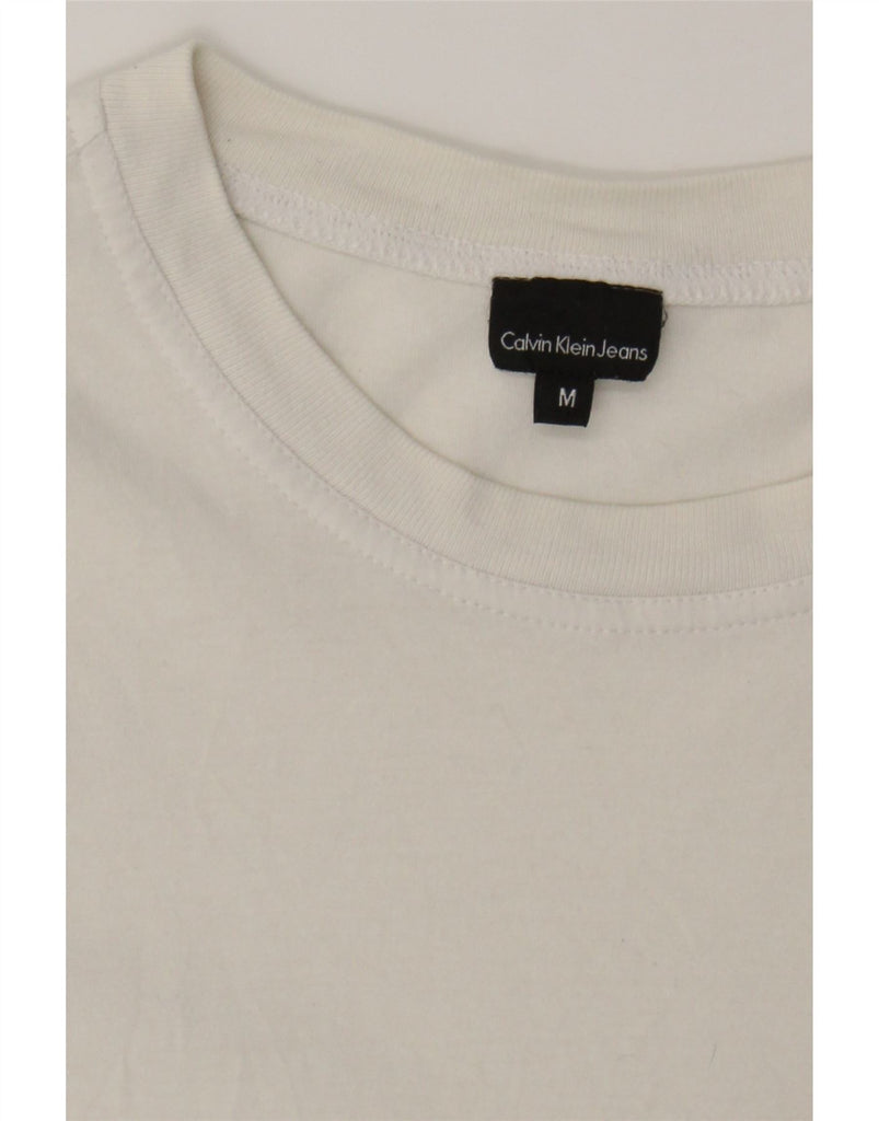 CALVIN KLEIN JEANS Mens Graphic T-Shirt Top Medium White Cotton Classic Vintage Calvin Klein Jeans and Second-Hand Calvin Klein Jeans from Messina Hembry 