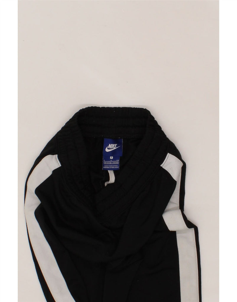 NIKE Boys Tracksuit Trousers Joggers 8-9 Years Small Black Colourblock Vintage Nike and Second-Hand Nike from Messina Hembry 