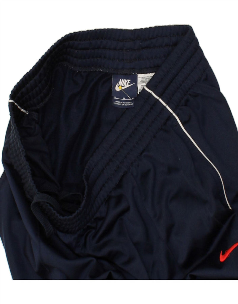 NIKE Mens Tracksuit Trousers Medium Navy Blue Polyester Vintage Nike and Second-Hand Nike from Messina Hembry 