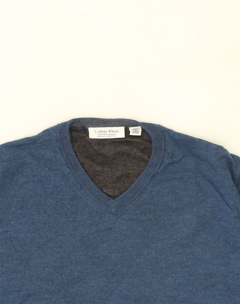 CALVIN KLEIN Mens V-Neck Jumper Sweater Large Navy Blue Wool | Vintage Calvin Klein | Thrift | Second-Hand Calvin Klein | Used Clothing | Messina Hembry 