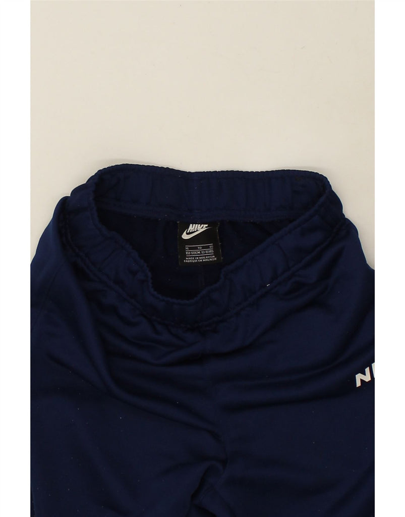 NIKE Boys Tracksuit Trousers Joggers 13-14 Years XL Navy Blue Polyester | Vintage Nike | Thrift | Second-Hand Nike | Used Clothing | Messina Hembry 