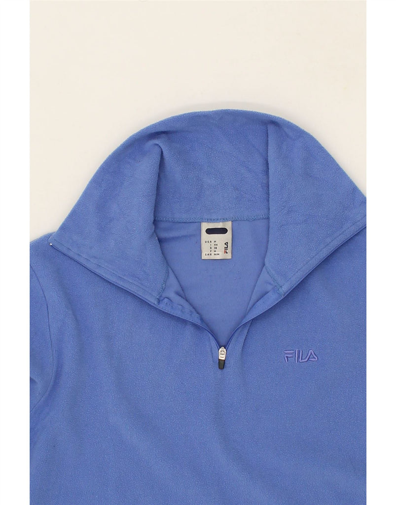 FILA Womens Zip Neck Fleece Jumper UK 14 Medium Blue Polyester Vintage Fila and Second-Hand Fila from Messina Hembry 