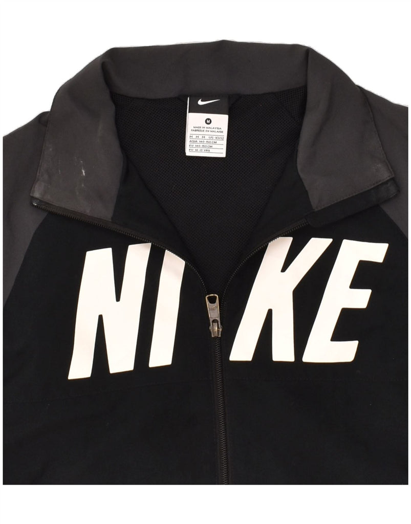 NIKE Boys Graphic Tracksuit Top Jacket 10-11 Years Medium Black | Vintage Nike | Thrift | Second-Hand Nike | Used Clothing | Messina Hembry 