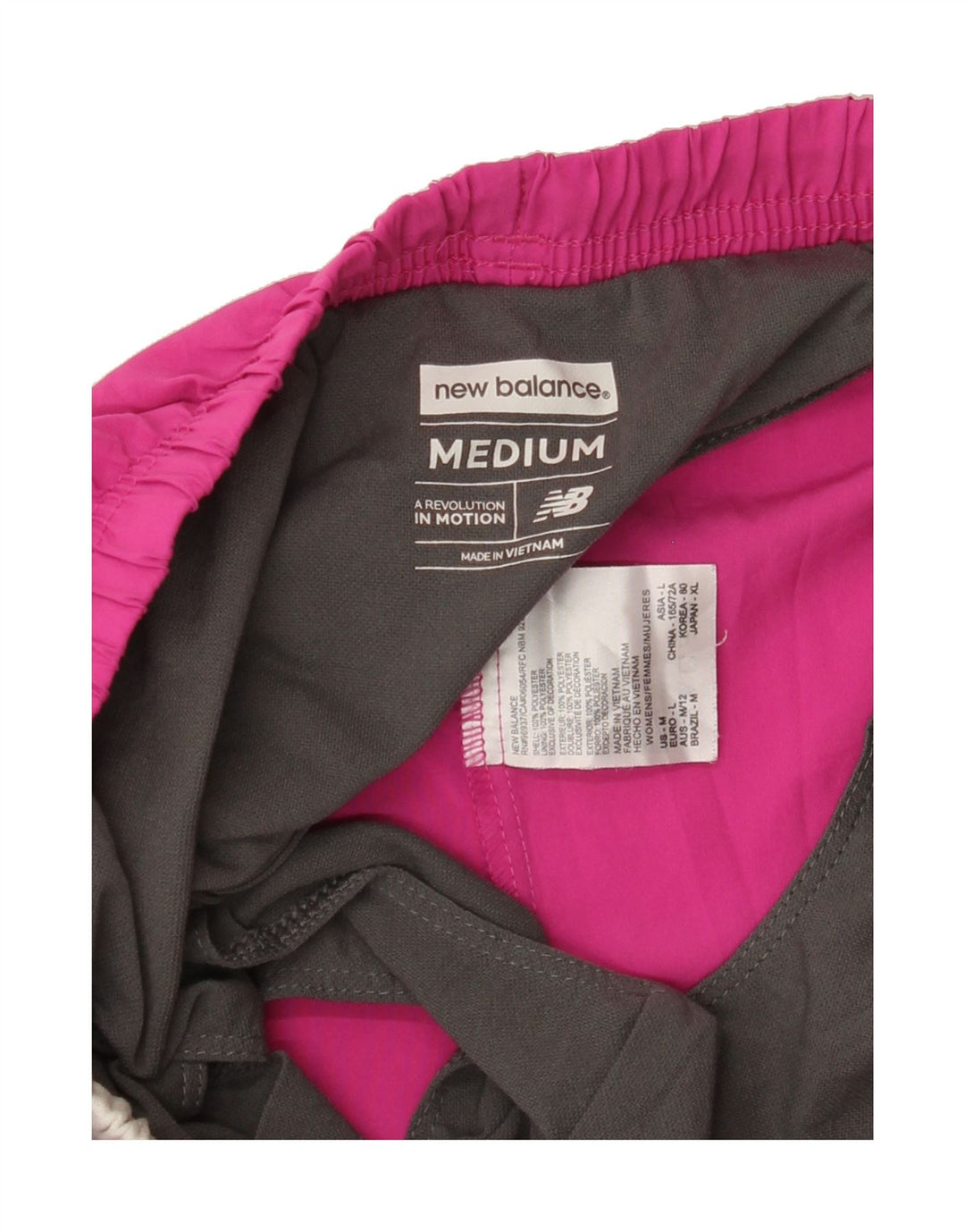 NEW BALANCE Womens Sport Shorts UK 12 Medium Pink Colourblock Polyester Vintage New Balance and Second-Hand New Balance from Messina Hembry 