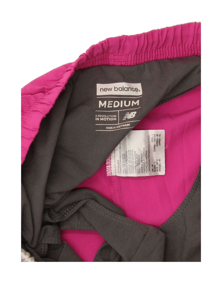 NEW BALANCE Womens Sport Shorts UK 12 Medium Pink Colourblock Polyester Vintage New Balance and Second-Hand New Balance from Messina Hembry 