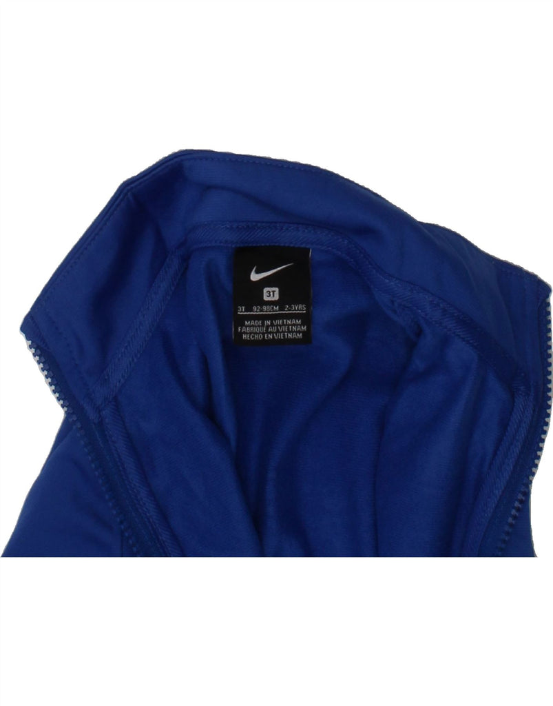 NIKE Boys Graphic Tracksuit Top Jacket 2-3 Years Blue Colourblock Vintage Nike and Second-Hand Nike from Messina Hembry 