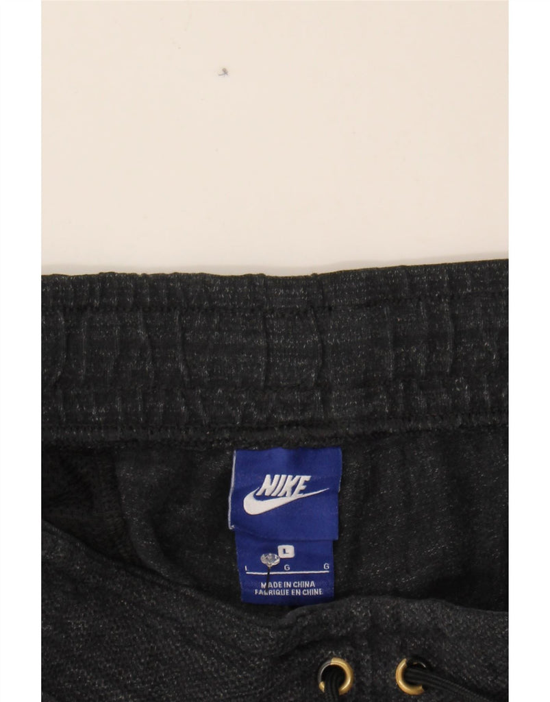 NIKE Mens Tracksuit Trousers Joggers Large  Black Polyester Vintage Nike and Second-Hand Nike from Messina Hembry 