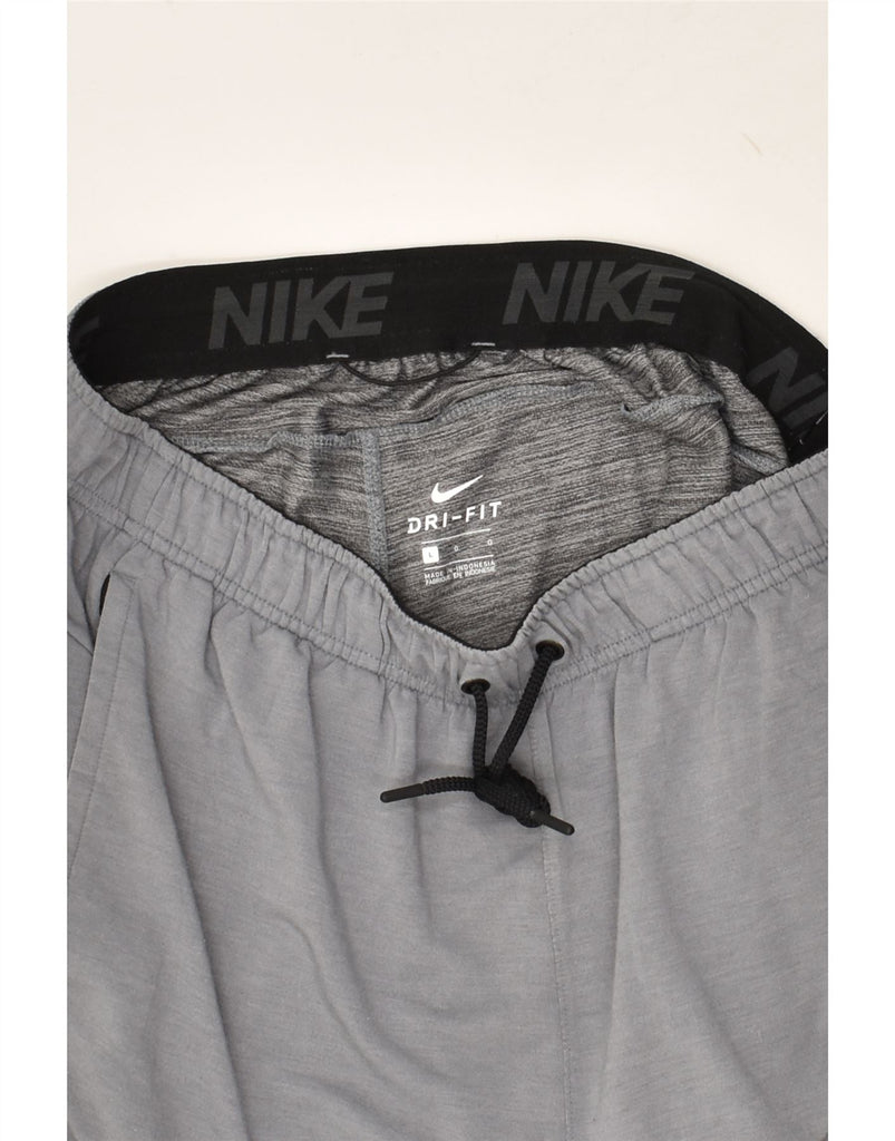NIKE Mens Dri Fit Tracksuit Trousers Joggers Large Grey Viscose | Vintage Nike | Thrift | Second-Hand Nike | Used Clothing | Messina Hembry 