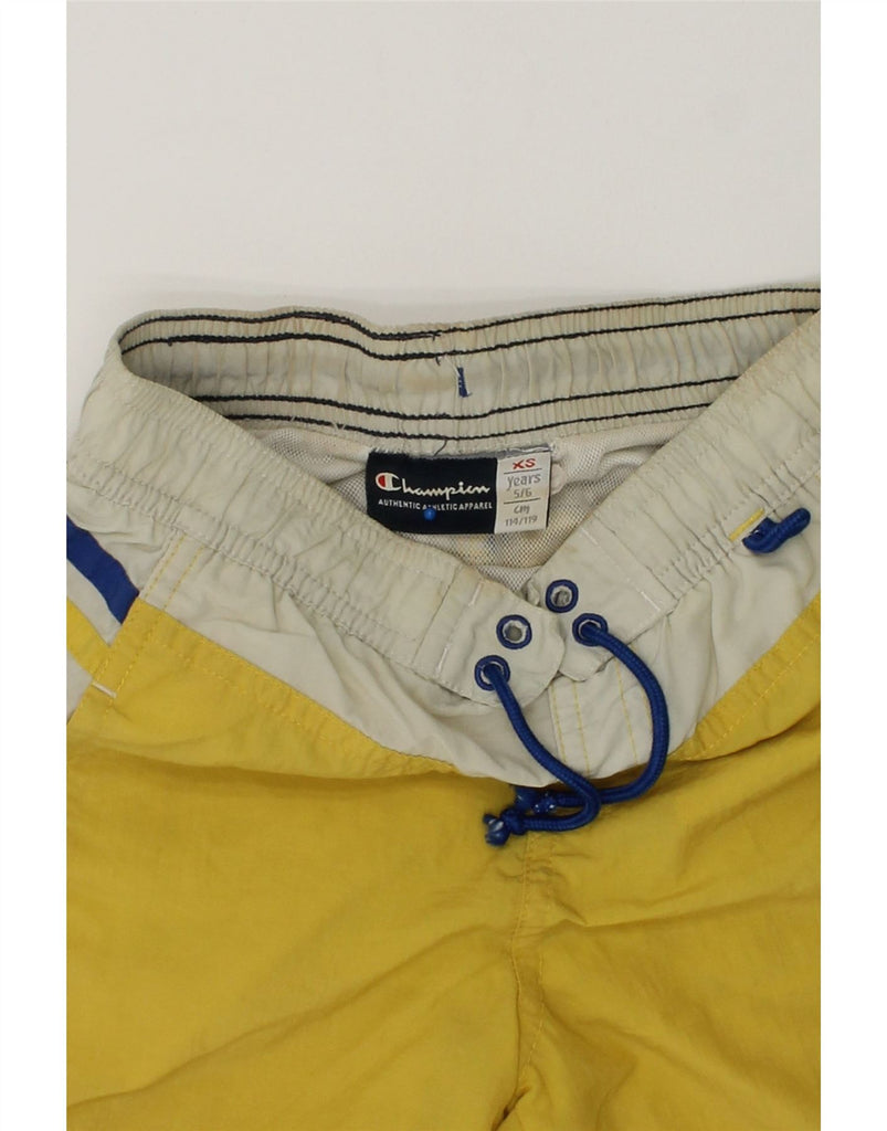 CHAMPION Boys Swimming Shorts 5-6 Years XS Yellow Polyamide | Vintage Champion | Thrift | Second-Hand Champion | Used Clothing | Messina Hembry 