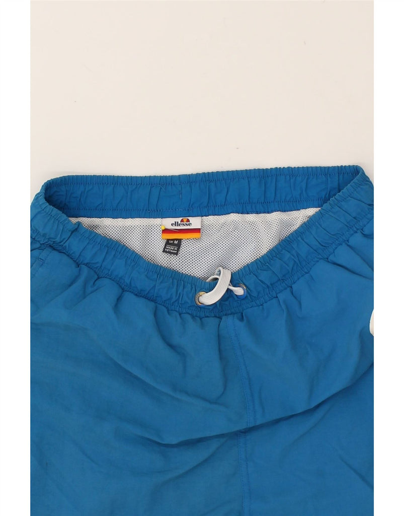 ELLESSE Mens Graphic Sport Shorts Medium Blue Nylon | Vintage Ellesse | Thrift | Second-Hand Ellesse | Used Clothing | Messina Hembry 