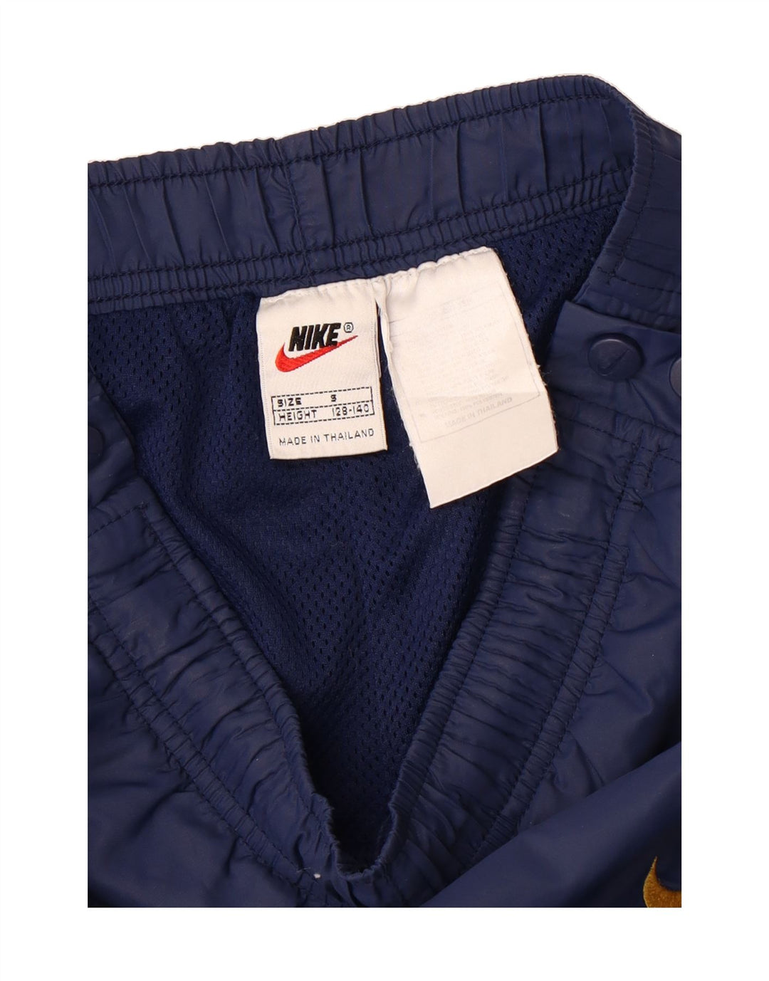 NIKE Boys Tracksuit Trousers 8-9 Years Small Navy Blue Polyester Vintage Nike and Second-Hand Nike from Messina Hembry 
