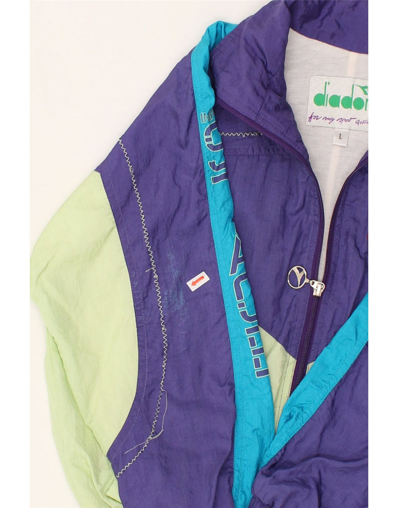 DIADORA Womens Graphic Tracksuit Top Jacket UK 16 Large Purple Colourblock | Vintage Diadora | Thrift | Second-Hand Diadora | Used Clothing | Messina Hembry 