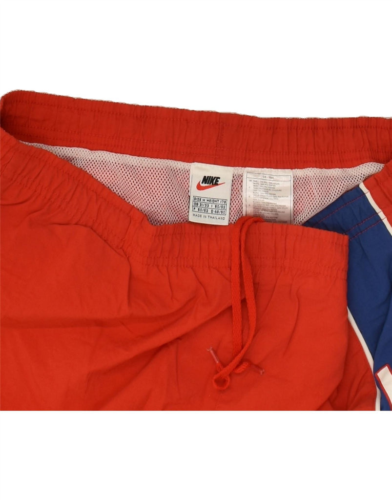 NIKE Mens Graphic Sport Shorts Medium Red Colourblock Nylon | Vintage Nike | Thrift | Second-Hand Nike | Used Clothing | Messina Hembry 