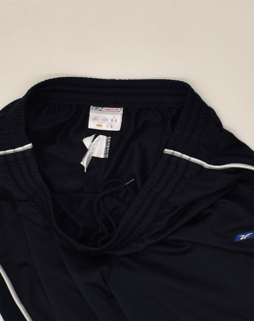 REEBOK Mens Tracksuit Trousers Large Navy Blue Polyester | Vintage Reebok | Thrift | Second-Hand Reebok | Used Clothing | Messina Hembry 