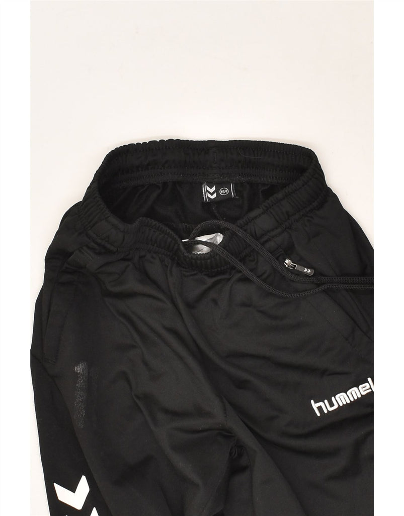 HUMMEL Boys Graphic Tracksuit Trousers 13-14 Years Black Polyester | Vintage Hummel | Thrift | Second-Hand Hummel | Used Clothing | Messina Hembry 