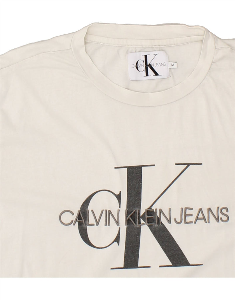 CALVIN KLEIN JEANS Mens Graphic T-Shirt Top Medium White Cotton | Vintage Calvin Klein Jeans | Thrift | Second-Hand Calvin Klein Jeans | Used Clothing | Messina Hembry 