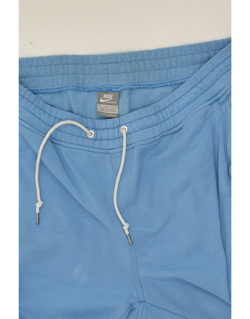 NIKE Mens Tracksuit Trousers Medium Blue Cotton | Vintage Nike | Thrift | Second-Hand Nike | Used Clothing | Messina Hembry 