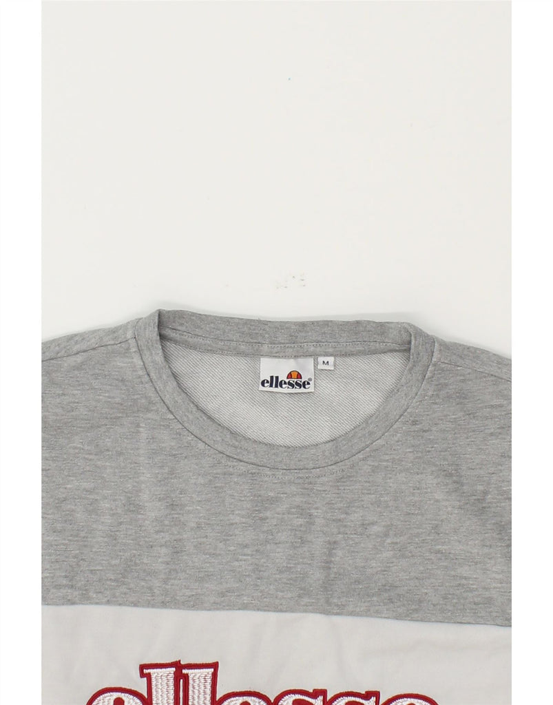 ELLESSE Womens Graphic Sweatshirt Jumper UK 14 Medium Black Colourblock Vintage Ellesse and Second-Hand Ellesse from Messina Hembry 