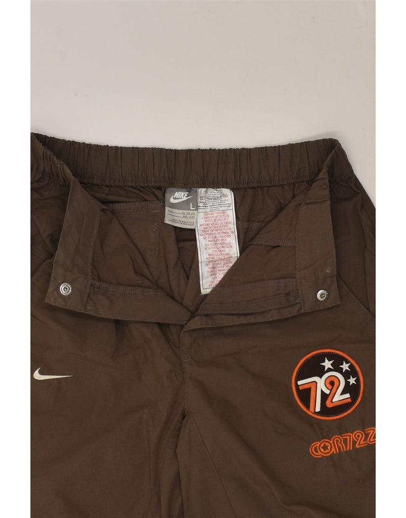 NIKE Boys Straight Casual Trousers 12-13 Years Large W26 L29  Brown | Vintage Nike | Thrift | Second-Hand Nike | Used Clothing | Messina Hembry 