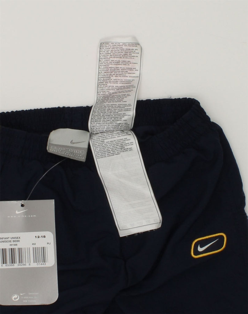 NIKE Baby Boys Tracksuit Trousers 12-18 Months Navy Blue Nylon | Vintage Nike | Thrift | Second-Hand Nike | Used Clothing | Messina Hembry 