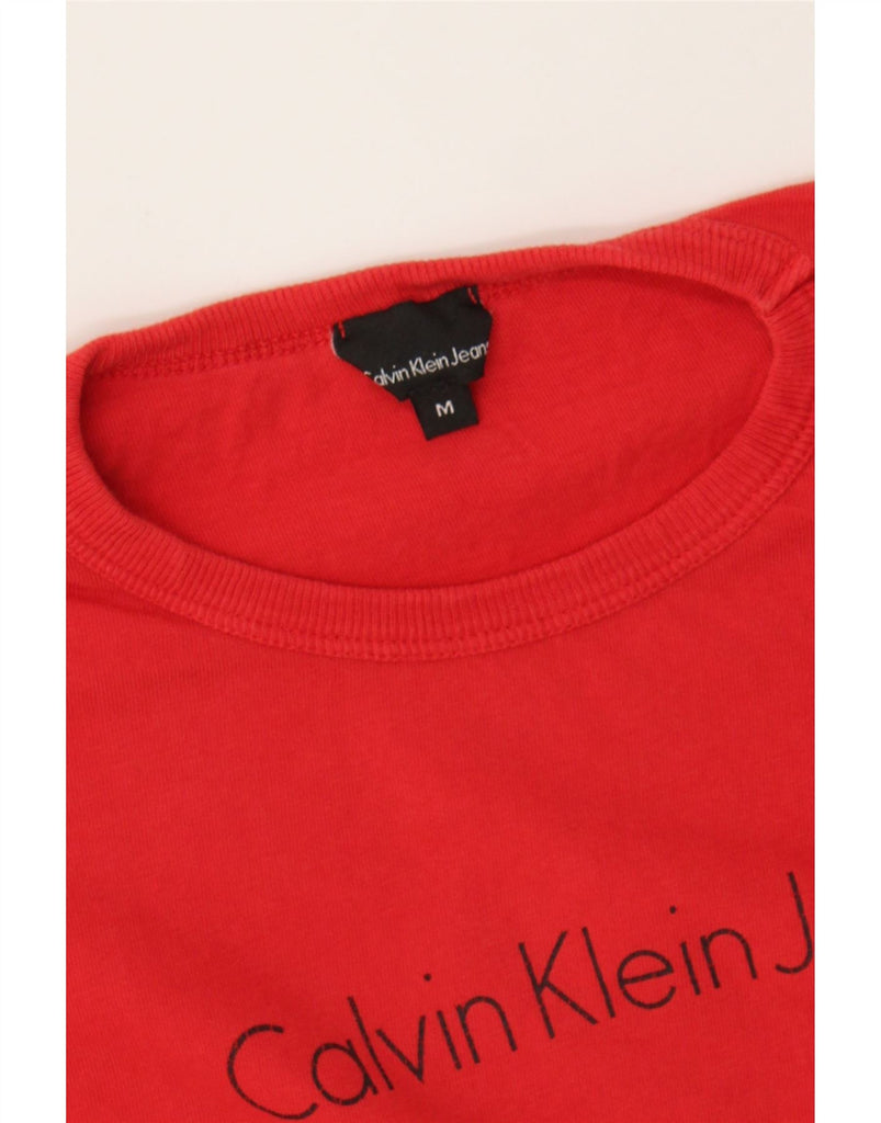 CALVIN KLEIN JEANS Womens Graphic Top Long Sleeve UK 12 Medium Red Cotton Vintage Calvin Klein Jeans and Second-Hand Calvin Klein Jeans from Messina Hembry 