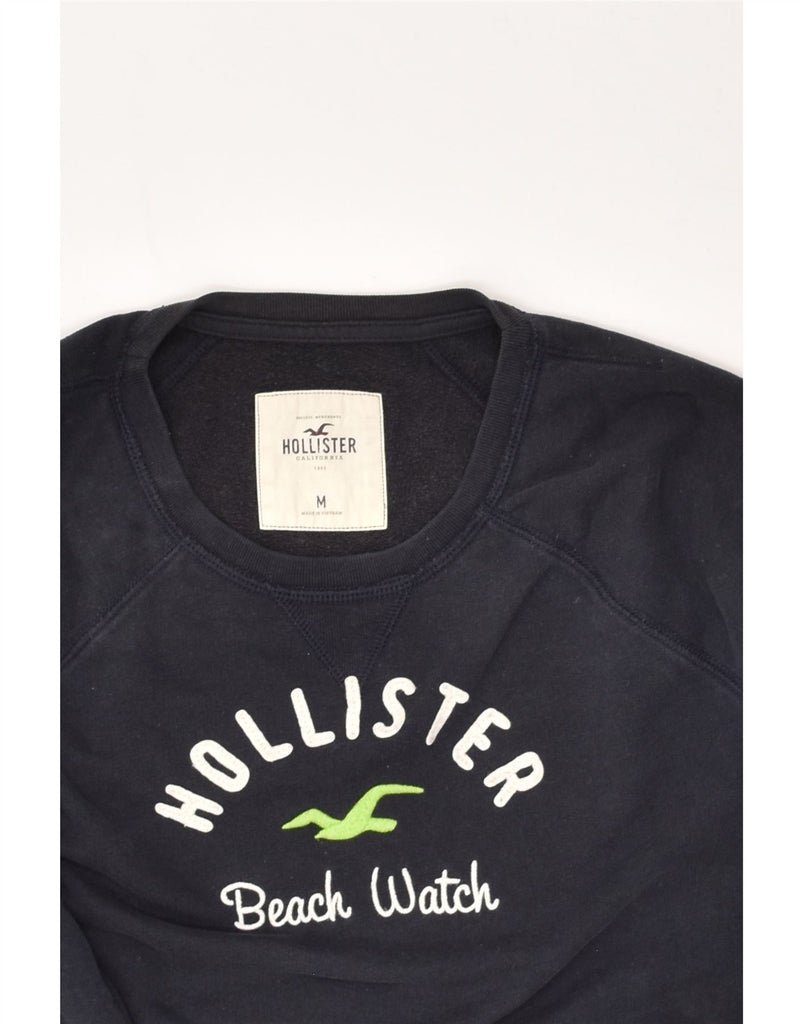 HOLLISTER Womens Graphic Sweatshirt Jumper UK 14 Medium Navy Blue Cotton | Vintage Hollister | Thrift | Second-Hand Hollister | Used Clothing | Messina Hembry 