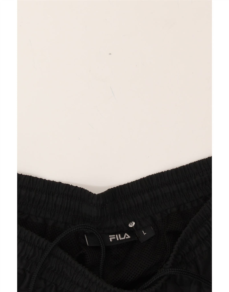 FILA Mens Tracksuit Trousers Large  Black Polyester Vintage Fila and Second-Hand Fila from Messina Hembry 