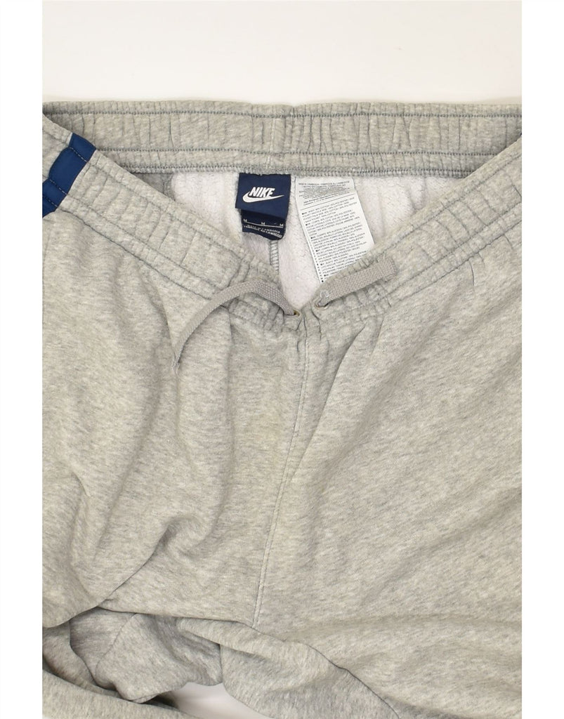 NIKE Mens Tracksuit Trousers Joggers Medium Grey Cotton | Vintage Nike | Thrift | Second-Hand Nike | Used Clothing | Messina Hembry 