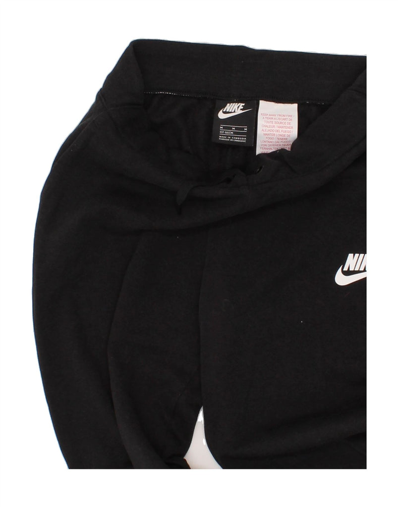 NIKE Boys Tracksuit Trousers Joggers 10-11 Years Medium Black Cotton Vintage Nike and Second-Hand Nike from Messina Hembry 