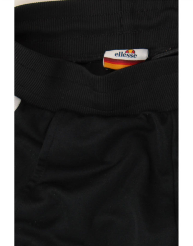 ELLESSE Womens Tracksuit Trousers Joggers UK 4 XS Black Colourblock Vintage Ellesse and Second-Hand Ellesse from Messina Hembry 