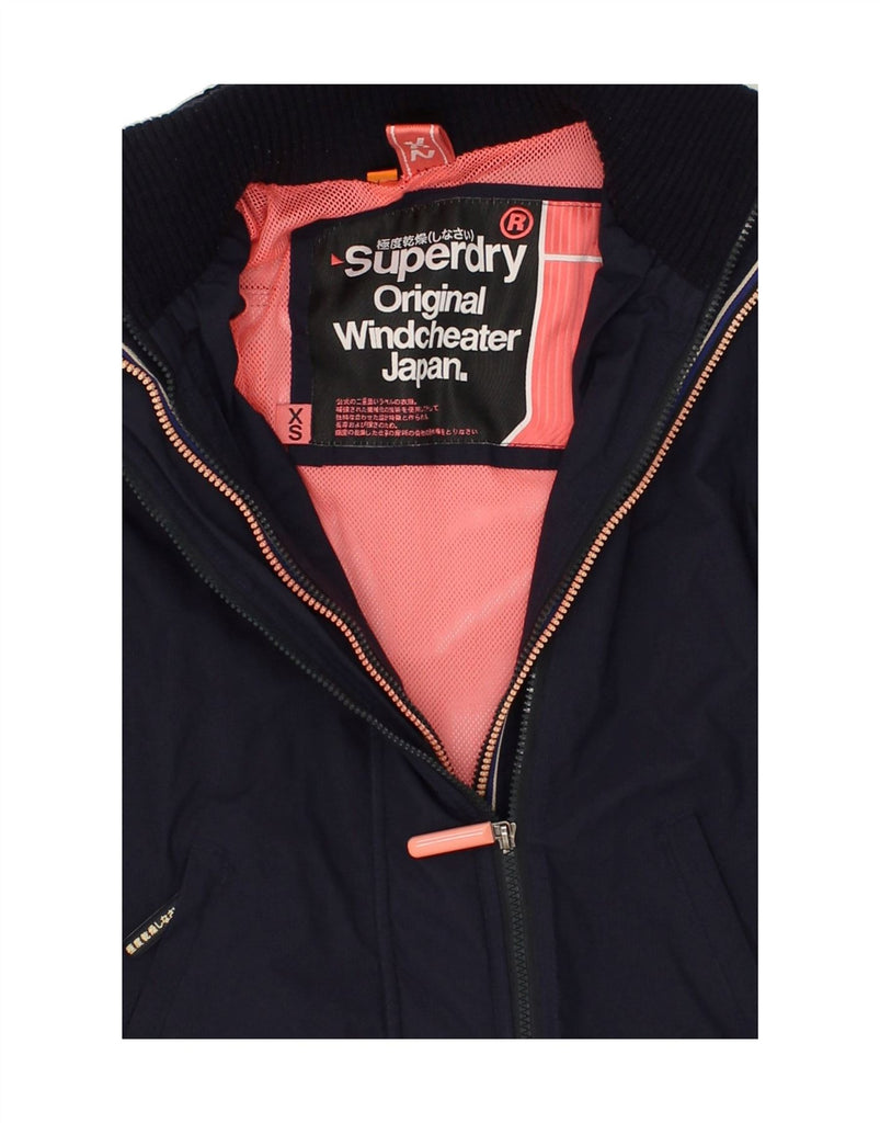 SUPERDRY Womens Windcheater Windbreaker Jacket UK 6 XS Navy Blue Nylon Vintage Superdry and Second-Hand Superdry from Messina Hembry 