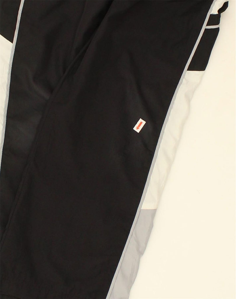 NIKE Boys Tracksuit Trousers 8-9 Years Small  Black Colourblock Polyester | Vintage Nike | Thrift | Second-Hand Nike | Used Clothing | Messina Hembry 