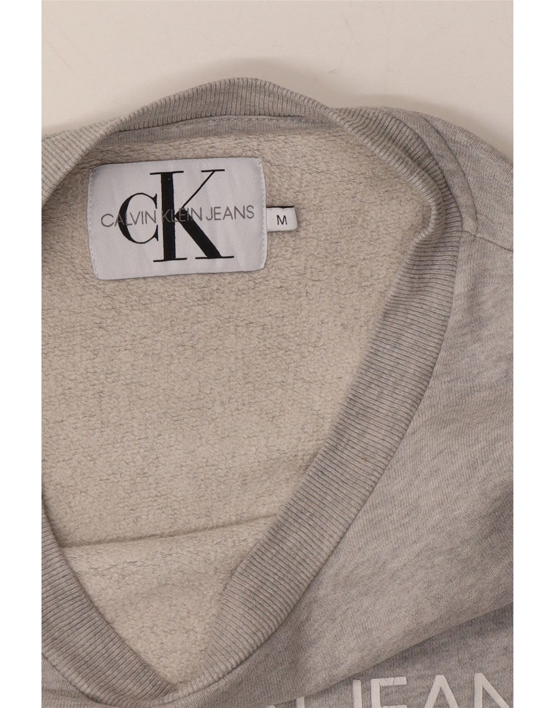 CALVIN KLEIN JEANS Mens Graphic Sweatshirt Jumper Medium Grey Cotton Vintage Calvin Klein Jeans and Second-Hand Calvin Klein Jeans from Messina Hembry 