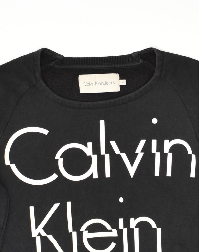 CALVIN KLEIN Womens Graphic Sweatshirt Jumper UK 14 Medium Black Cotton | Vintage Calvin Klein | Thrift | Second-Hand Calvin Klein | Used Clothing | Messina Hembry 