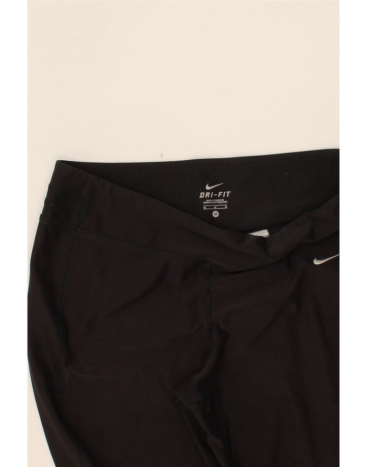 NIKE Womens Dri Fit Tracksuit Trousers UK 14 Medium Black Polyester Vintage Nike and Second-Hand Nike from Messina Hembry 