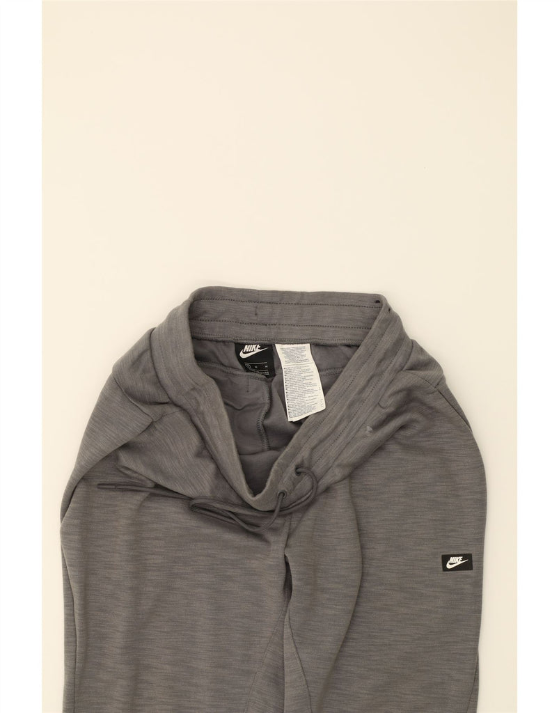 NIKE Mens Tracksuit Trousers Joggers Medium Grey Cotton Vintage Nike and Second-Hand Nike from Messina Hembry 