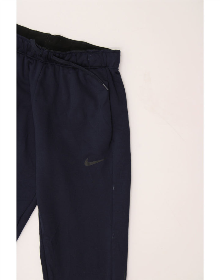 NIKE Womens Tracksuit Trousers Joggers UK 8 Small  Navy Blue Polyester Vintage Nike and Second-Hand Nike from Messina Hembry 