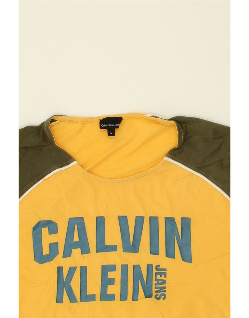 CALVIN KLEIN JEANS Womens Graphic T-Shirt Top UK 16 Large Yellow | Vintage Calvin Klein Jeans | Thrift | Second-Hand Calvin Klein Jeans | Used Clothing | Messina Hembry 