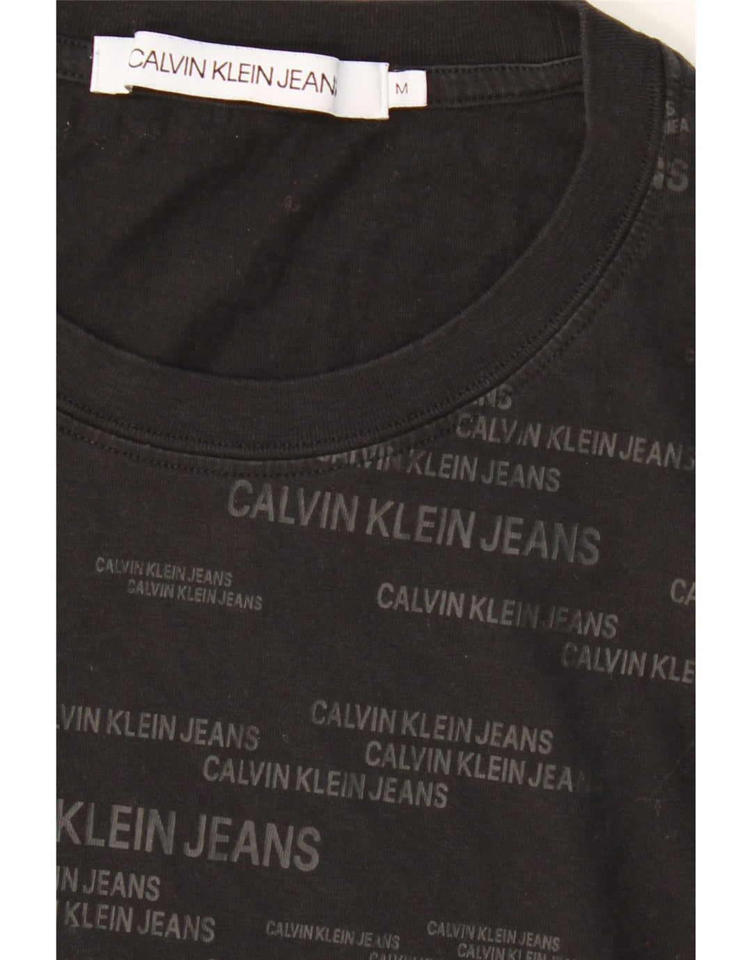 CALVIN KLEIN JEANS Mens Graphic T-Shirt Top Medium Black Cotton Vintage Calvin Klein Jeans and Second-Hand Calvin Klein Jeans from Messina Hembry 