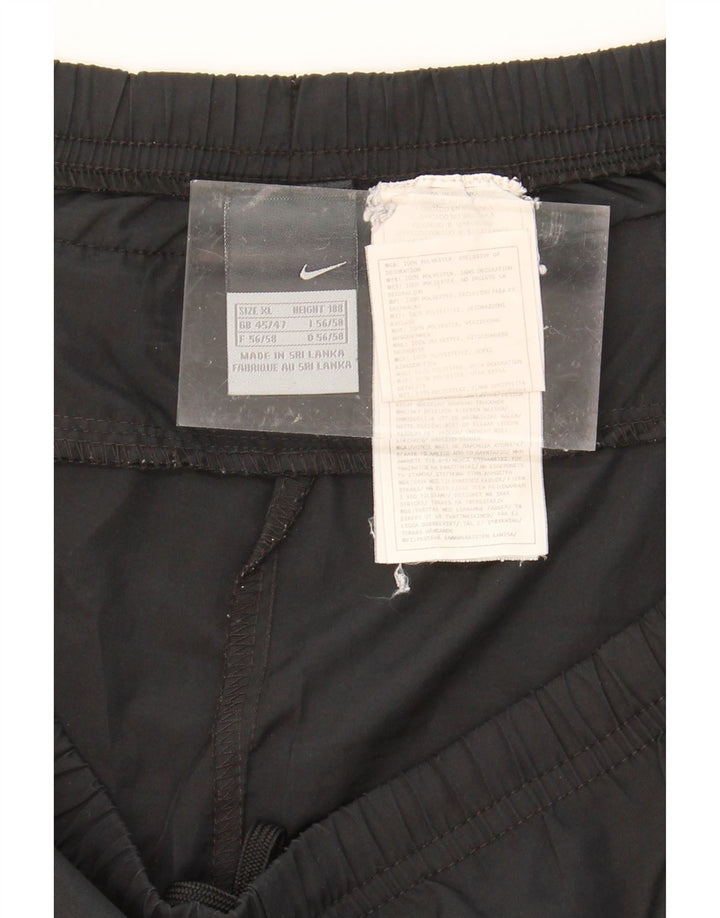 NIKE Mens Tracksuit Trousers UK 45/47 XL Black Polyester Vintage Nike and Second-Hand Nike from Messina Hembry 