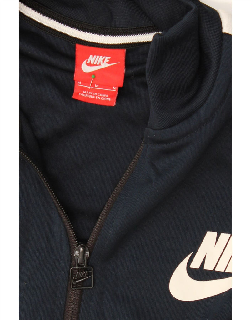 NIKE Mens Tracksuit Top Jacket Medium Navy Blue Colourblock Polyester Vintage Nike and Second-Hand Nike from Messina Hembry 