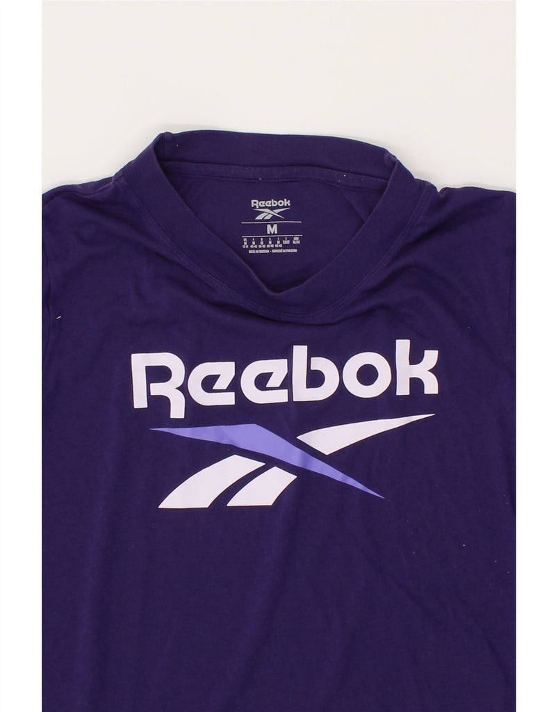 REEBOK Womens Graphic T-Shirt Top UK 12/14 Medium Purple Cotton Vintage Reebok and Second-Hand Reebok from Messina Hembry 