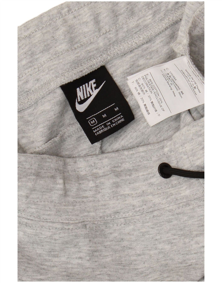 NIKE Mens Tracksuit Trousers Joggers Medium  Grey Colourblock Cotton