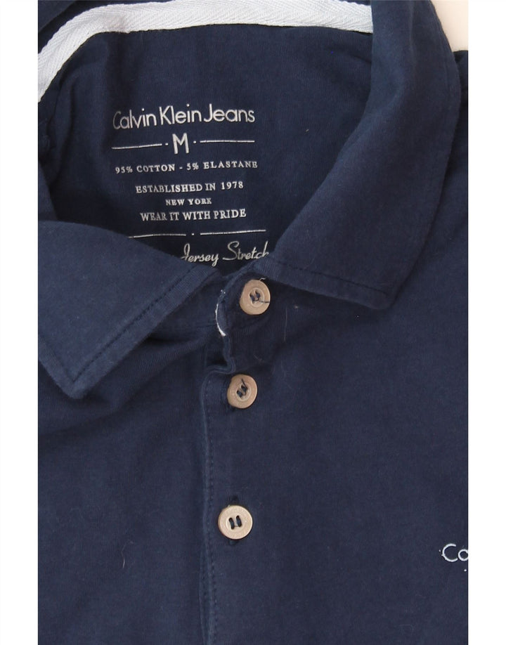 CALVIN KLEIN JEANS Boys Polo Shirt 15-16 Years Medium Navy Blue Vintage Calvin Klein Jeans and Second-Hand Calvin Klein Jeans from Messina Hembry 