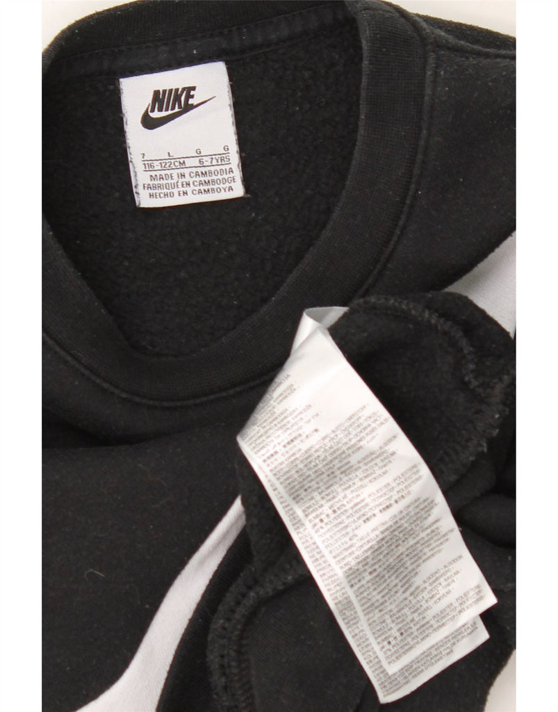 NIKE Girls Graphic Sweatshirt Jumper 6-7 Years Large Black Cotton Vintage Nike and Second-Hand Nike from Messina Hembry 