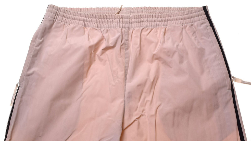 REEBOK Womens Rain Tracksuit Trousers Medium Beige Polyester - Second Hand & Vintage Designer Clothing - Messina Hembry