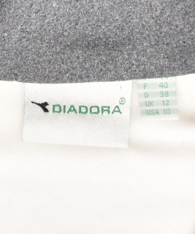 DIADORA Womens Oversized Tracksuit Top Jacket UK 12 Medium White | Vintage | Thrift | Second-Hand | Used Clothing | Messina Hembry 
