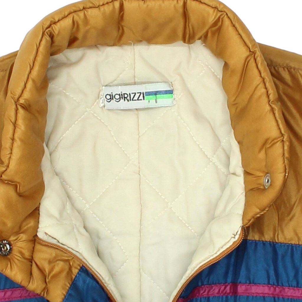 GigiRizzi Womens Gold Ski Suit + Reversible Padded Gilet | Vintage Winter Sports | Vintage Messina Hembry | Thrift | Second-Hand Messina Hembry | Used Clothing | Messina Hembry 